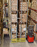 Raymond 5000 Series Orderpicker in warehouse aisle